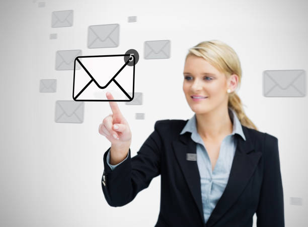 istock Businesswoman pressing email symbol 827075546