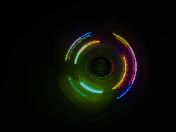 istock Colorful light neon circle in dark black background 827084252