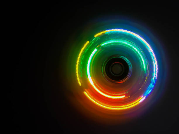 istock Colorful light neon circle in dark black background 827084258