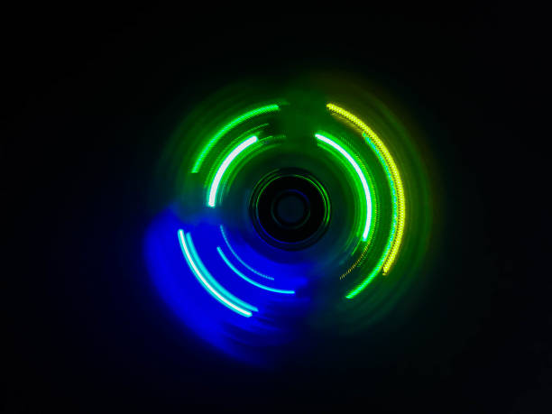 istock Colorful light neon circle in dark black background 827084262