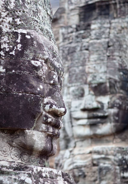 istock Giant stone face at Prasat Bayon Temple, Cambodia 827091836
