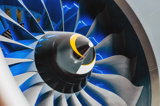 istock Airplane engine and blades with blue backlight close up 827092578