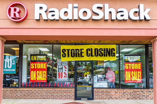 Burke: Radio Shack store entrance facade with closing sale sign