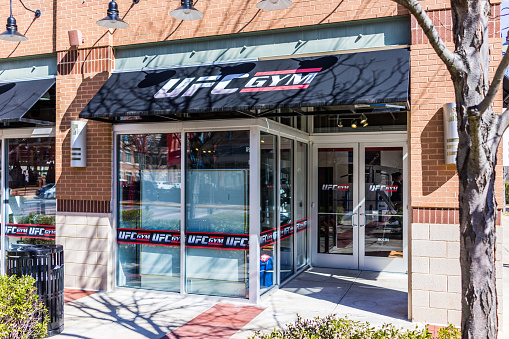 Fairfax: UFC Gym entrance with signs
