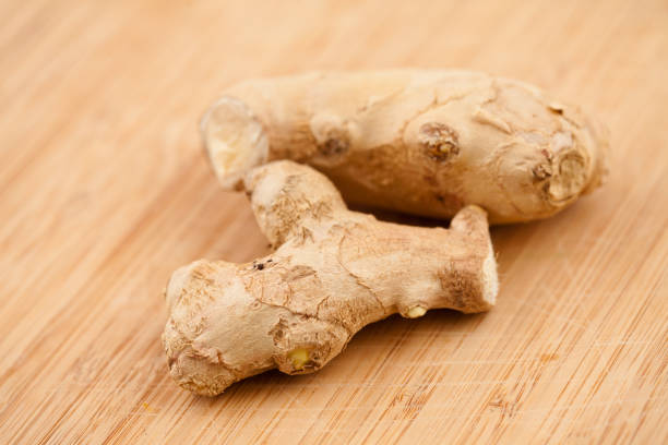 istock Piece of ginger on a worktop 827102390