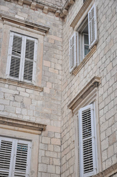 istock window blinds of a building 827104126