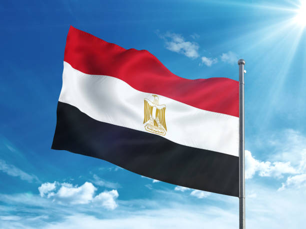 istock Egypt flag waving in the blue sky 827117810