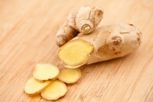 istock Slice of ginger and piece of ginger 827118574