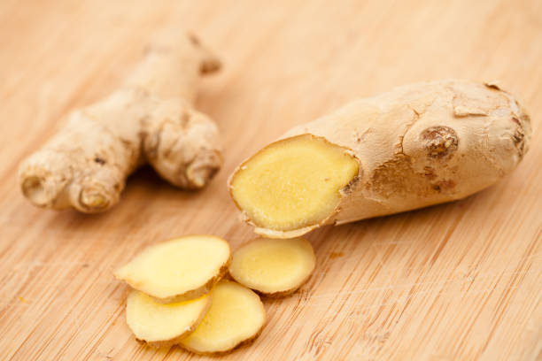 istock Slice of ginger and piece of ginger 827118606