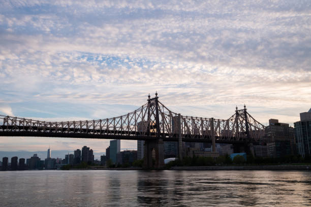 istock Queensboro Bridge and the East River at dusk 827122922