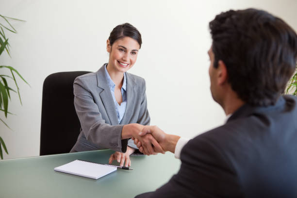 istock Manager shaking the hand of a customer 827128746