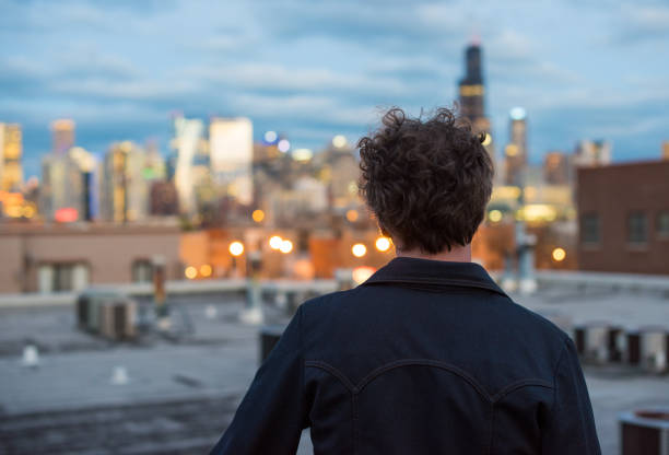 istock Attractive forty something man on a city rooftop 827139060