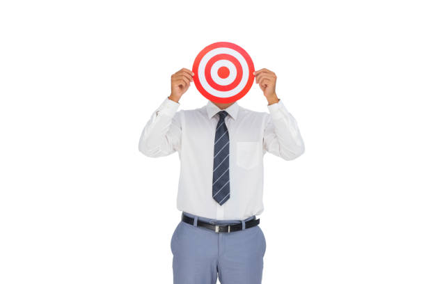 istock Businessman hiding his face behind a red target 827144636