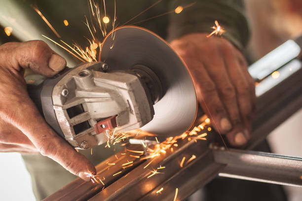 istock Electric wheel grinding on steel structure in factory 827144710