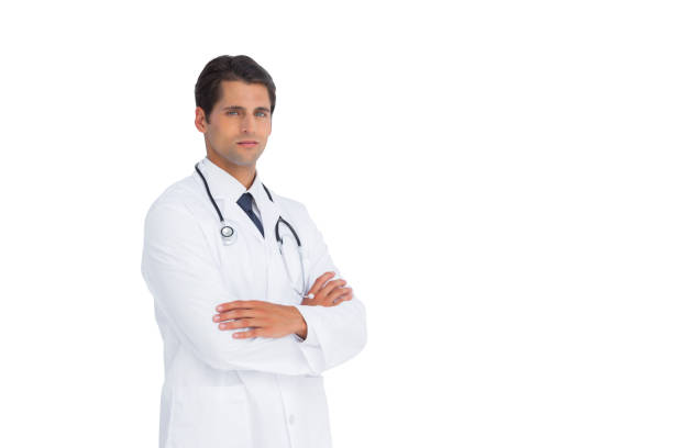 istock Handsome doctor standing with arms crossed 827145134