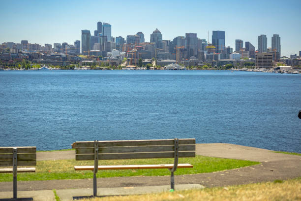 istock Sun over Seattle, park bench in the foreground 827145646