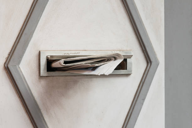 Newspaper in a mail slot