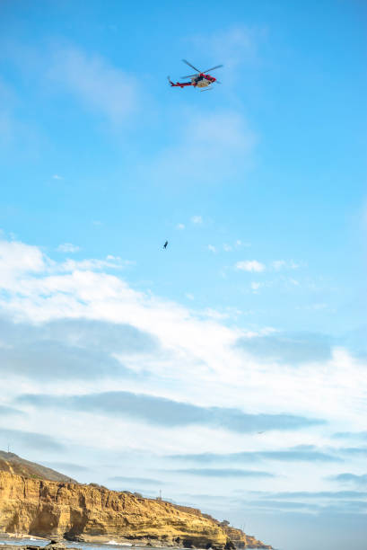 istock US coastguard helicopter in flight with emergency response 827148320