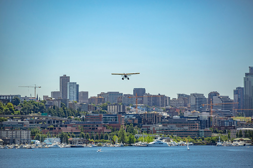 Float plane taking off in Seattle on t he bay. Float plane taking off from the bay in Seattle Washington