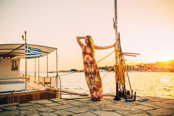 istock Woman having fun on vacation in Greece 827154716