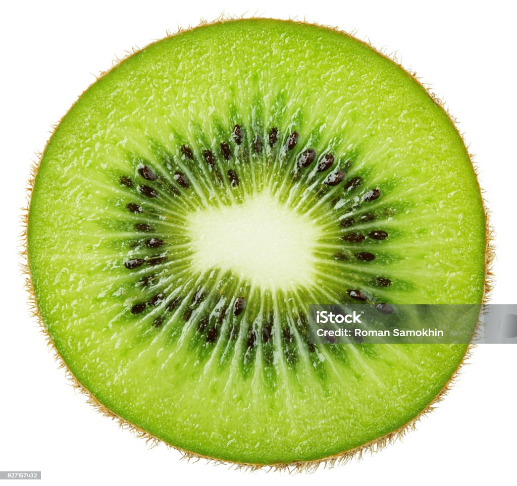 Fetta di kiwi isolata su bianco - Foto stock royalty-free di Frutto Kiwi