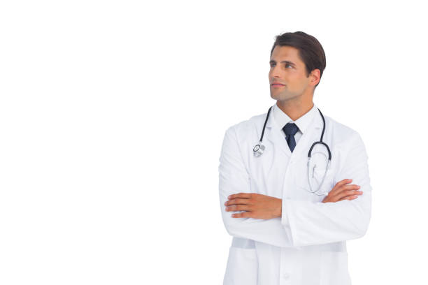 istock Smliing doctor with arms crossed looking up 827158322