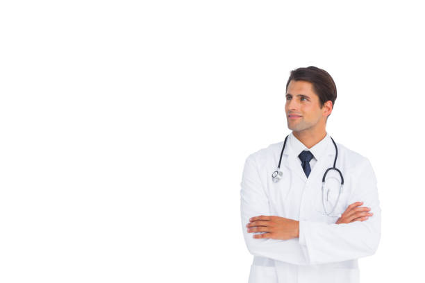 istock Happy doctor with arms crossed looking up 827158330