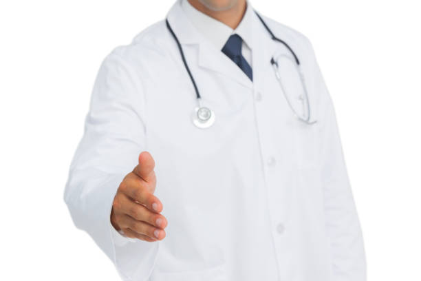 istock Doctor reaching out for a handshake 827158636