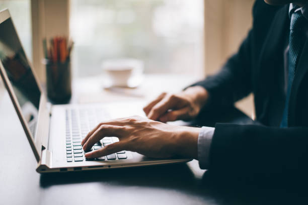 istock Business man hands on-a laptop keyboard 827161366