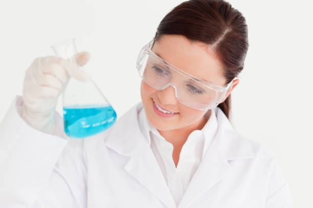 istock Good looking scientist holding a beaker in a laboratory 827164286