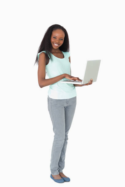 istock Woman typing on her laptop on white background 827167016