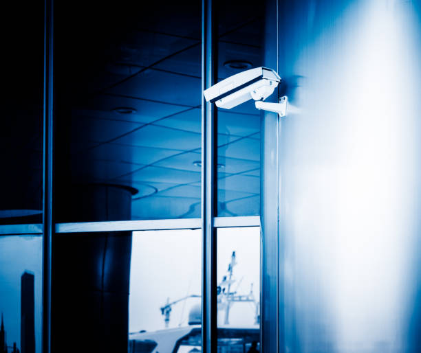 istock detail shot of CCTV security camera hanging on column 827177050
