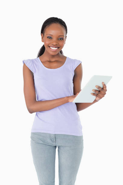 istock Close up of woman using her tablet on white background 827179706