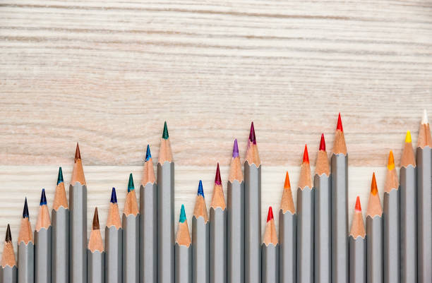 istock Flat layer of colored pencils In  form of a ladder 827187240