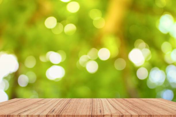 istock Empty wood table and  light bokeh for Christmas  New Year background. with copy space  add  text 827187298