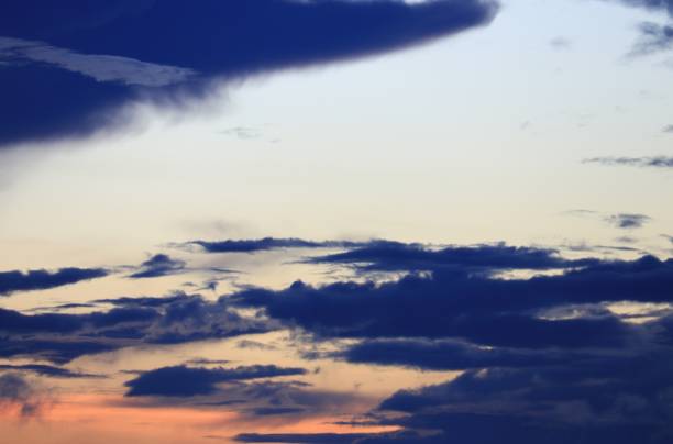 istock sky in sunset and cloud, beautiful colorful evening nature  space for add text 827194026