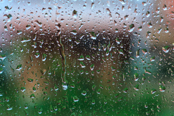 istock Natural water drops on glass 827197560