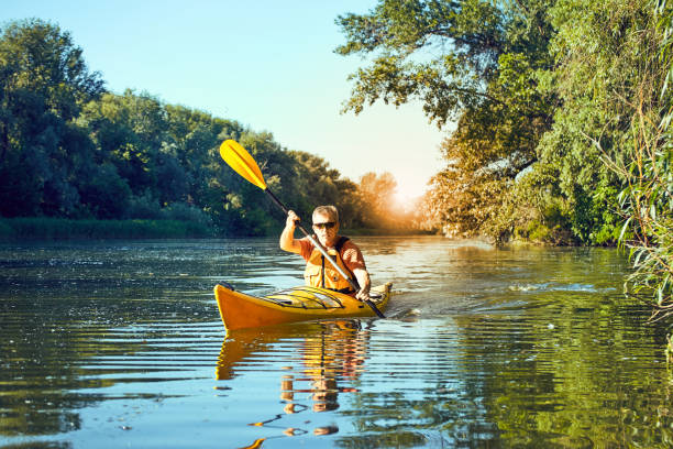 istock A canoe trip on the river in the summer. 827201476