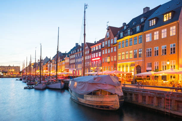 istock Copenhagen port city at night in Denmark 827201766