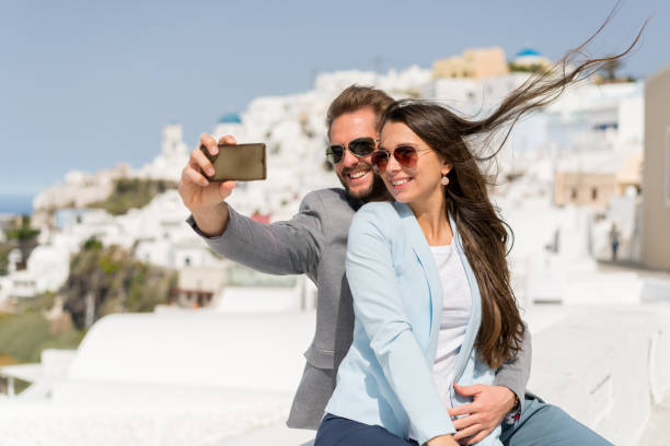 istock couple selfie santorini 827205450