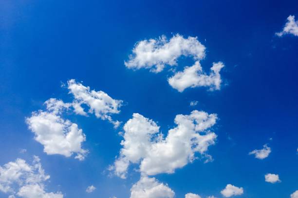 istock Isolated white cloud on blue sky. Beautiful blue sky with clouds background. Sky with clouds weather nature cloud blue. Blue sky with cloud and sun 827205608