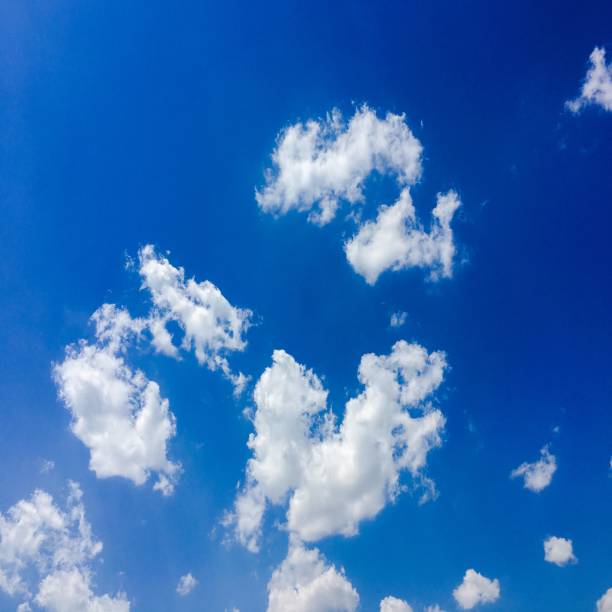 istock Isolated white cloud on blue sky. Beautiful blue sky with clouds background. Sky with clouds weather nature cloud blue. Blue sky with cloud and sun 827205690