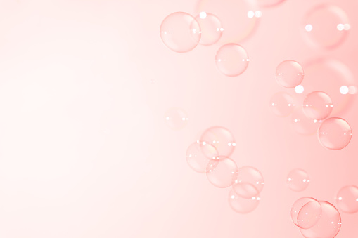 pink soap bubbles floating for background