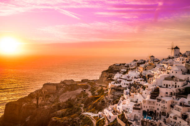 istock Cloud Typologies, colorful sunset sky over santorini 827214758