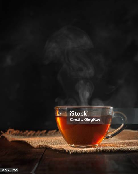 A Cup Of Freshly Brewed Black Tea Escaping Steam Warm Soft Light Darker Background Stock Photo - Download Image Now