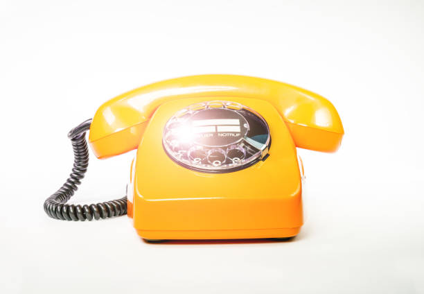 istock Old orange telephone from Germany 827219154