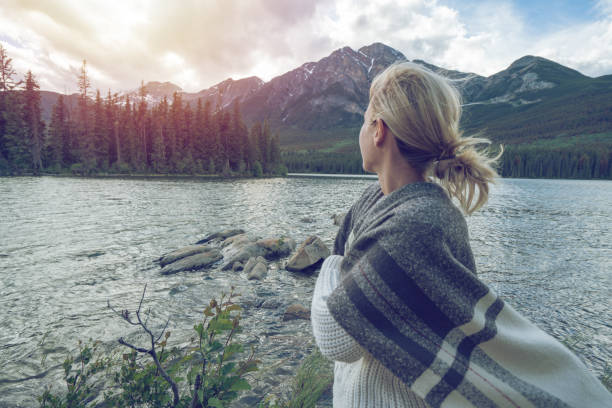 istock Young woman contemplating nature 827223694