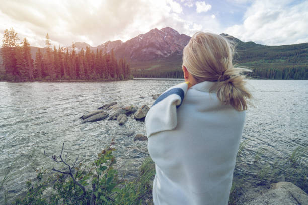 istock Young woman contemplating nature 827223782