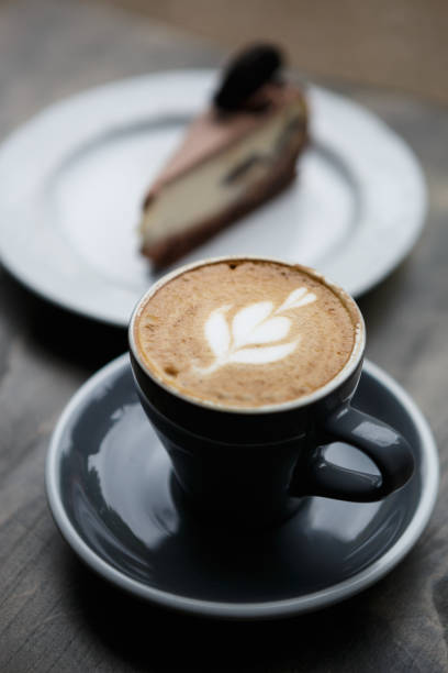 istock Enjoy fresh latte coffee drink with piece of cake 827223798