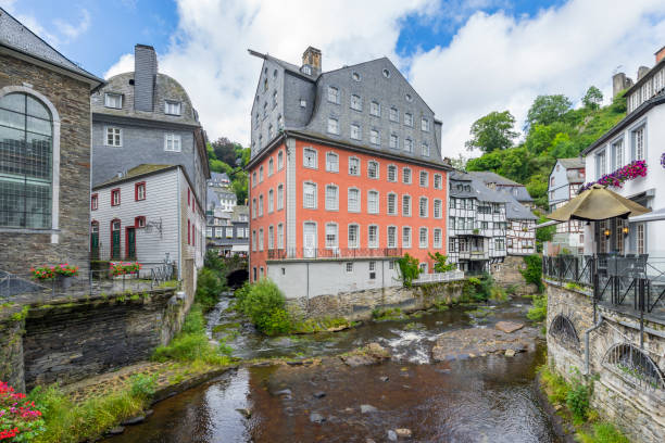 istock Creek Laufenbach flows into River Rur at Red House / Germany 827227464